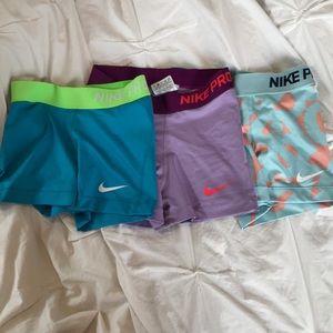 nike pros blue, lavender, light blue/orange